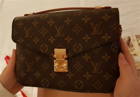 bolso louis vuitton como saber si es original|louis vuitton neverfull pouch strap.